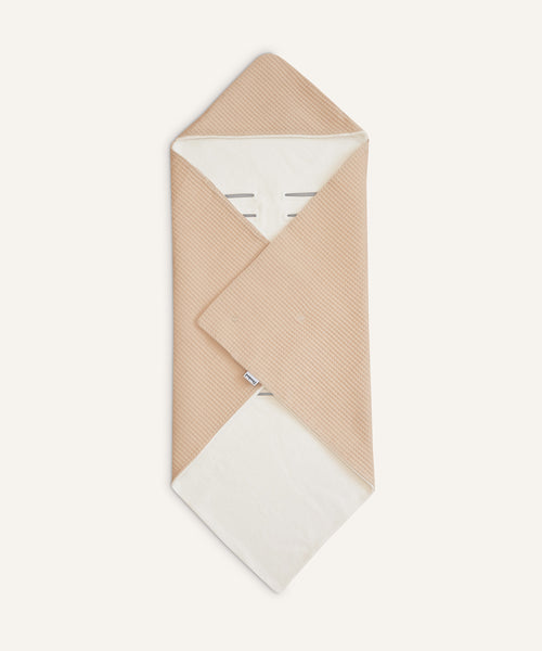 Einschlagdecke Beige-Creme.