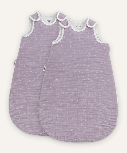 Babyschlafsack Musselin Flieder mit Pusteblumen.